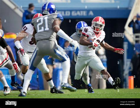 Georgia Wide Receiver Isaiah Mckenzie Right Returns A Kickoff For A