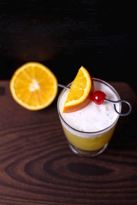 This Orange Whiskey Sour Recipe Goes Down Easy | Recipe | Whiskey sour recipe, Sour foods, Sour 
