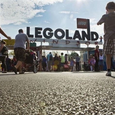 People Are Standing In Front Of The Entrance To Legoland