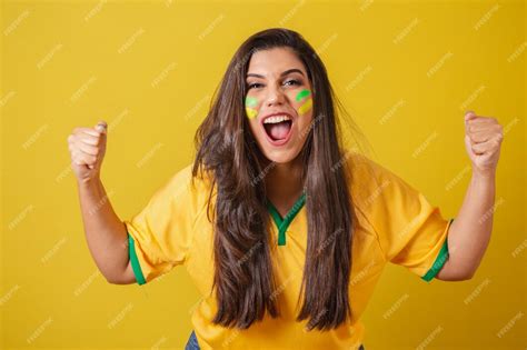 Premium Photo Woman Supporter Of Brazil 2022 World Cup Football Championship Screaming Goal