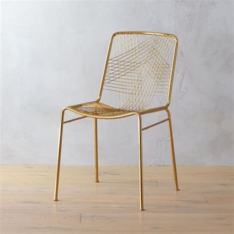 Browse modern dining room chairs with stylish lacquer paint finishes to add a pop of color to mealtime. Alpha Brass Chair + Reviews | CB2