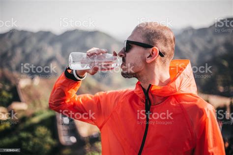 Man Drinking Water At Great Wall Stock Photo Download Image Now