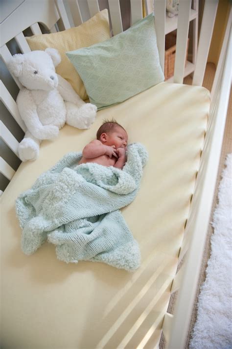 Grey monotones give this room a soft and peaceful feeling. And Baby Makes Three: My Nurseries