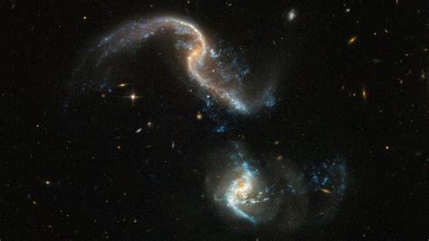 New Hubble Photo Shows 2 Galaxies Ripping Each Other Apart In A Merger