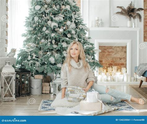 Happy Blonde Women In Christmas Decorations With Ts Stock Image Image Of Light T 134220061