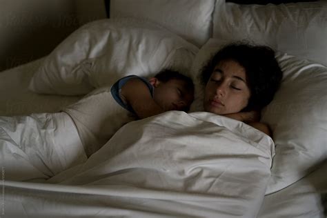 sister and brother peacefully sleeping together by stocksy contributor beatrix boros stocksy