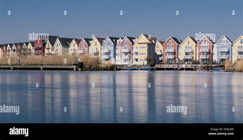 Long Exposure Of Colorful Wooden Houses Swedish Houses With Boat