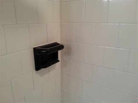 I noticed that the grout changed to darker color when wet. Shower Tile and Grout Repair | Touch of Gloss