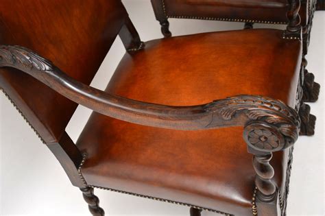 Light tan leather arm chair. Pair of Antique Leather Upholstered Carved Oak Carolean ...