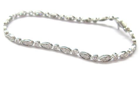 Art deco diamond platinum link bracelet. Tiffany & Co Platinum Swing Diamond Tennis Bracelet 7" 1 ...