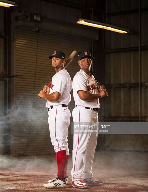 Xander Bogaerts And Rafael Devers Of The Boston Red Sox Pose For A
