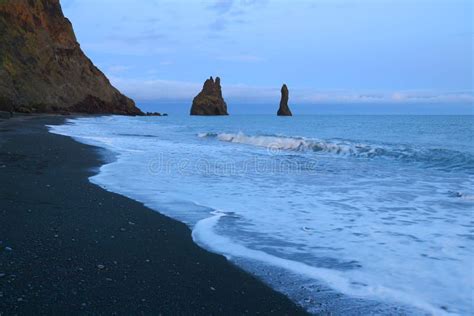 The Black Sand Beach Of Reynisfjara At Sunset Iceland Stock Photo