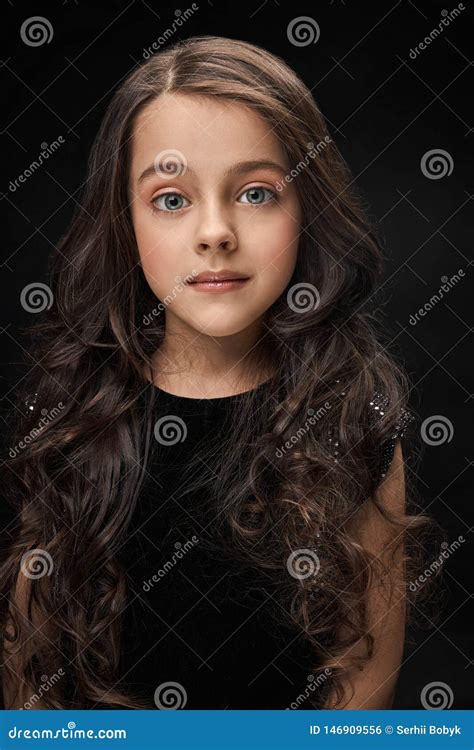Pretty Little Girl In Black Dress Posing Stock Photo Image Of