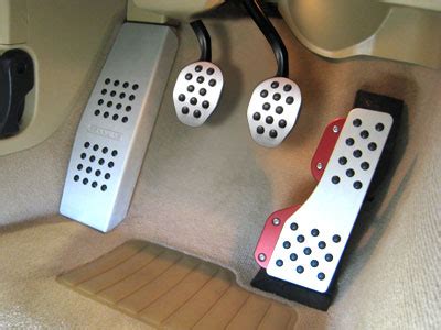 Open up the pedal packages and place the rubber inserts into the pedals. Rennline Aluminum Pedal Set - 4 Piece - Rubber Grip - BMW-Rennline, Inc.