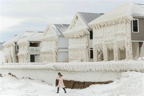 Beachfront Houses Along Lake Erie Are Draped In Ice After The Winter