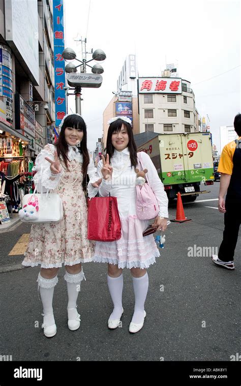 Japanese Girls Pose In The Harajuku District Of Tokyo In Japan Stock