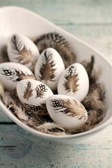 scandinavian style easter diy feather easter eggs shelterness