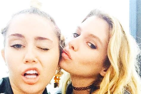 Miley Cyrus Locks Tongues With A Victorias Secret Model In A Car Park