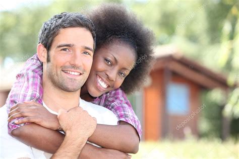 Interracial Couple Embracing Stock Photo By ©photography33 10154437