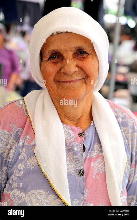 Upright Portrait Of Elderly Turkish Woman Market Stallholder In Kocegiz