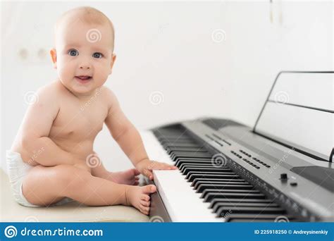 Adorable Talented Baby Playing The Piano Stock Photo Image Of Study