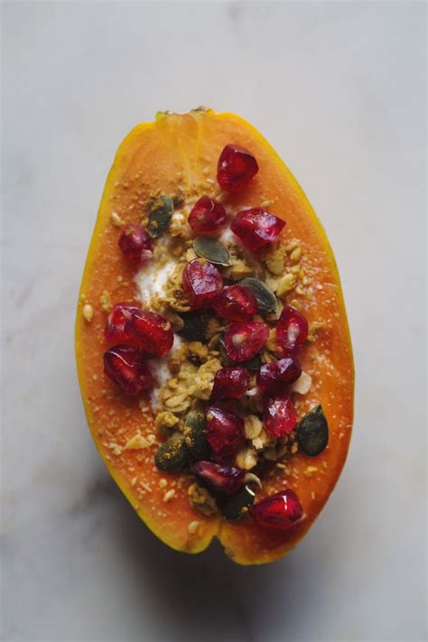 A sweet and colourful confectionery candied fruit mainly prepared from the raw papaya's or from the choice of berries. Crunchy Pomegranate Granola Papaya Boats! | Papaya recipes ...