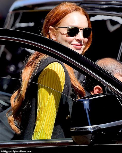 Lindsay Lohan Looks Ready For Spring As She Sports Sunshine Yellow