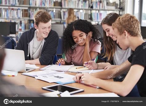 Group Of College Students Collaborating — Stock Photo © Monkeybusiness