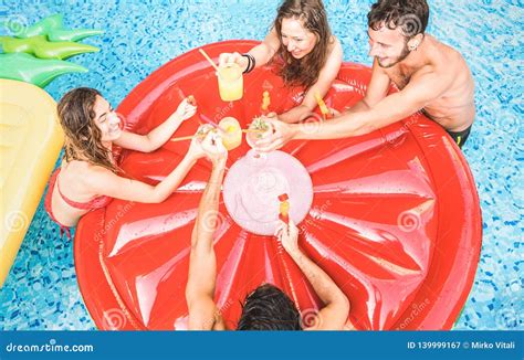 Top View Of Happy Friends Drinking Cocktails At Swimming Pool Party Vacation Concept With