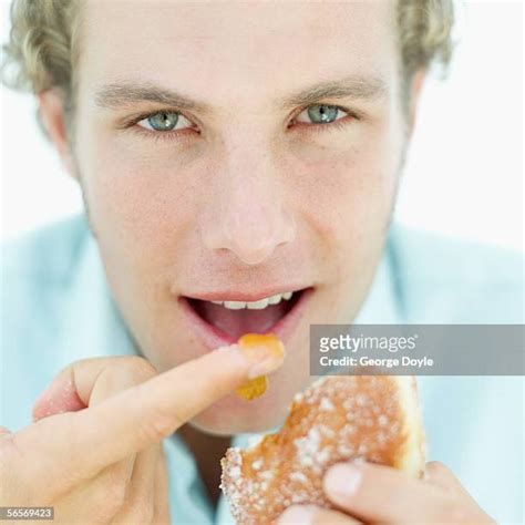 Hungry Man Lick Finger Photos And Premium High Res Pictures Getty Images