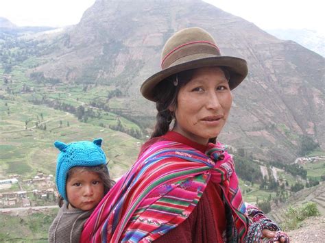 Peru Woman With Her Baby Both In Common Headgear Worn By The Quechua