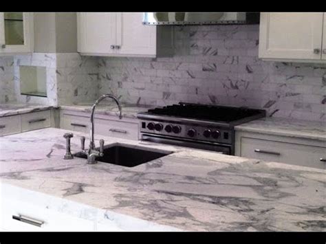 A black granite with white veins. Mesmerizing White Grey Granite Countertop - YouTube