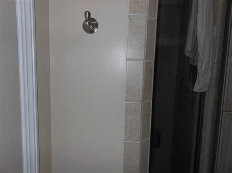 Remember that your bath will have at least a bath full of water and one. tile - How to finish tiling an outside edge for a shower? - Home Improvement Stack Exchange