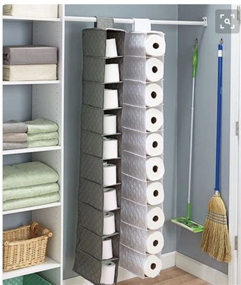 Do your towels end up on the floor and not on the hook? Bulk paper towel or TP storage idea | Diy toilet paper holder