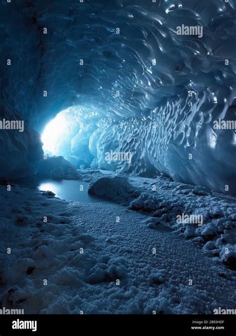 Light Streaming Into An Ice Cave In Iceland Stock Photo Alamy