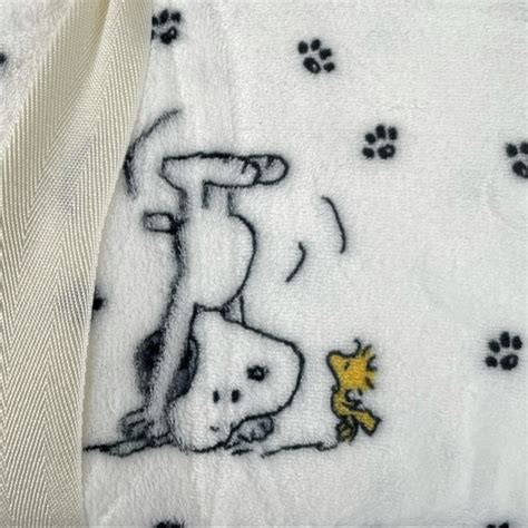 Peanuts Bedding Peanuts Snoopy Paw Print Throw Blanket White 9x90