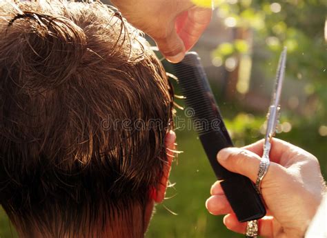 Unlike the high or low taper fade, a men's tapered haircut is cut with scissors instead of clippers. Haircut scissors stock photo. Image of adult, care ...