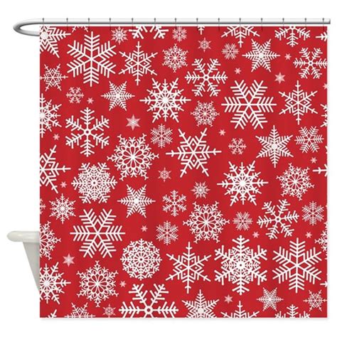 A Red Shower Curtain With White Snowflakes On It