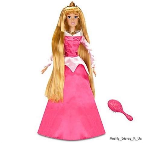 With her sparkling pink gown and long golden hair, our sleeping beauty steps out of a dream into your own fantasy realm. NEW Disney Store Sleeping Beauty Aurora Singing Doll 17 ...
