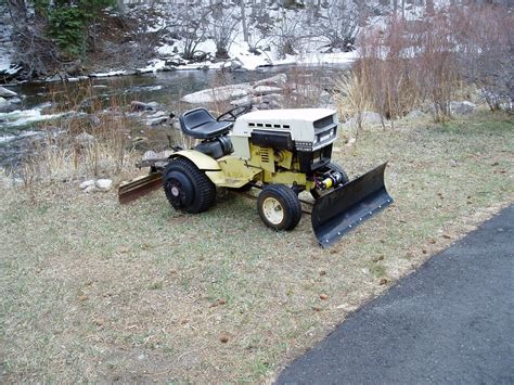 1969 Roper riding lawnmower converted to a snow plow for the cabin