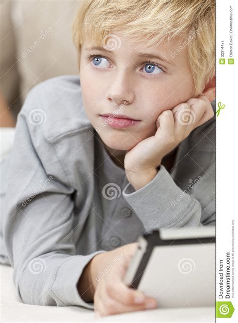 Black and white, eye, pupil, dilate. Blond Blue Eyes Boy Child Using Tablet Computer Stock ...