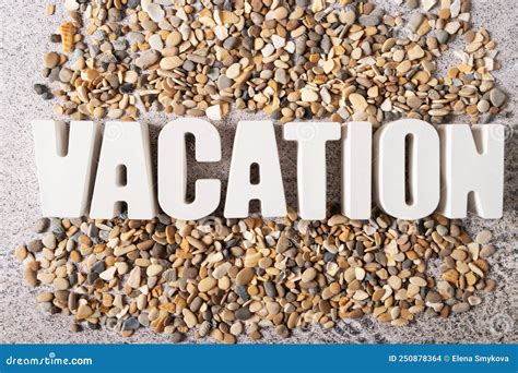 The Word Vacation Made Of Letters Made Of Plaster On The Background Of