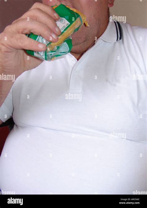 Obese Man Eating Pasty Hi Res Stock Photography And Images Alamy
