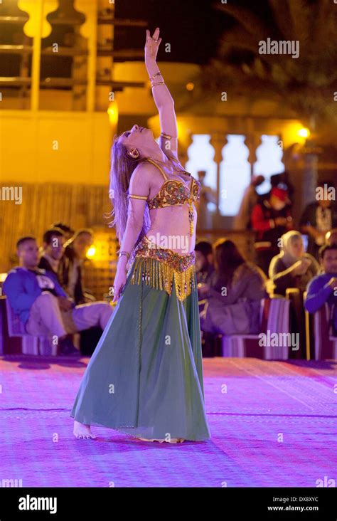 Belly Dancer Dancing A Belly Dance On A Desert Safari Dubai Uae Stock