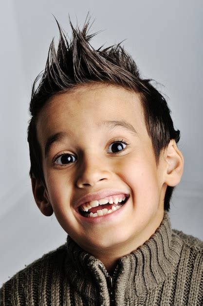 Premium Photo Portrait Of A Smiling Little Mixed Race Boy Isolated On