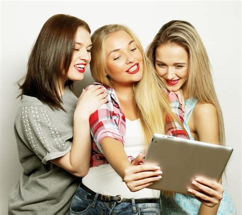 premium photo three girlfriends taking selfie with digital tablet