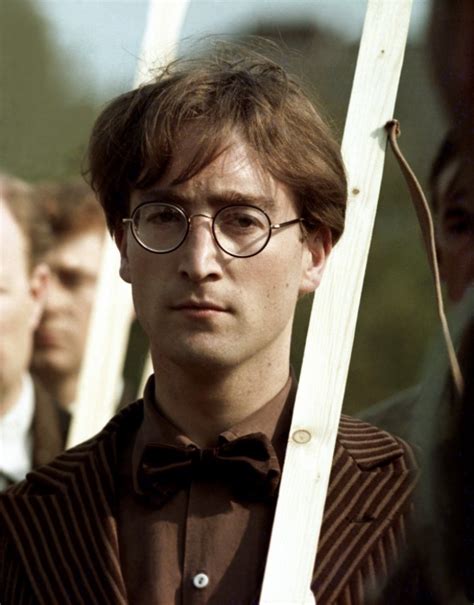 john lennon looked odd in late 1966 with his beatles haircut intact and glasses john lennon