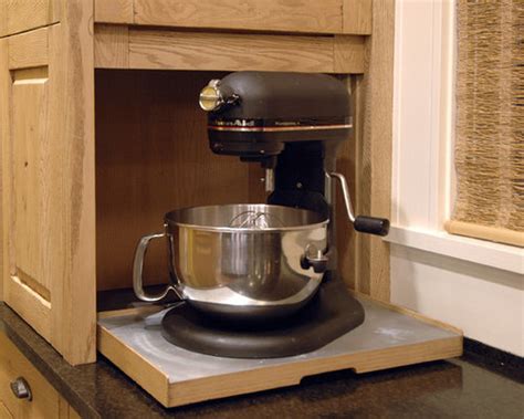 I like hiding small appliances in an appliance garage to limit clutter on countertops. Kitchenaid Mixer Storage | Houzz