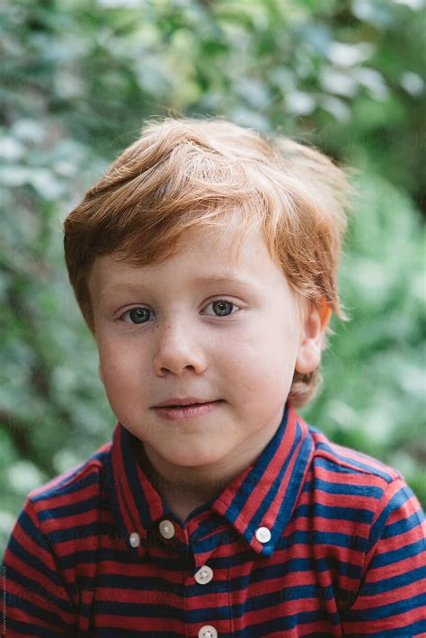 A Four Year Old Boy Posing For Portraits By Stocksy Contributor