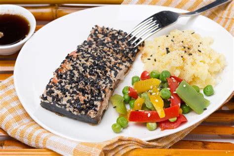 Pink Salmon Fillet In Sesame Breaded Vegetables Stock Image Image Of